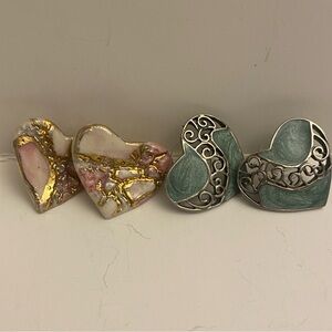 Two sets of heart earrings. Post earrings